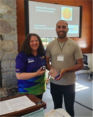 Title: Immediate Past District Governor Isabelle Hayer presents Dr. Yashar Keramati with a Humanitarian Service Award. - Description: Immediate Past District Governor Isabelle Hayer presents Dr. Yashar Keramati with a Humanitarian Service Award.